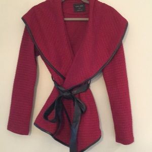 Wrap sweater with faux leather detail